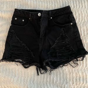 Black jean shorts with cutouts, US size 4